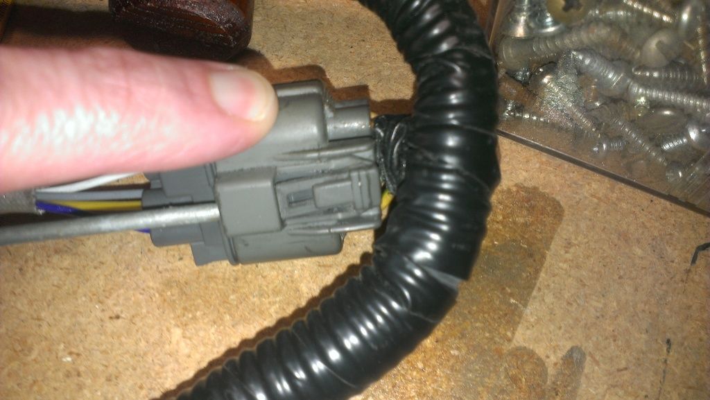 O2 sensor removal I can't get the wiring connector loose. Honda